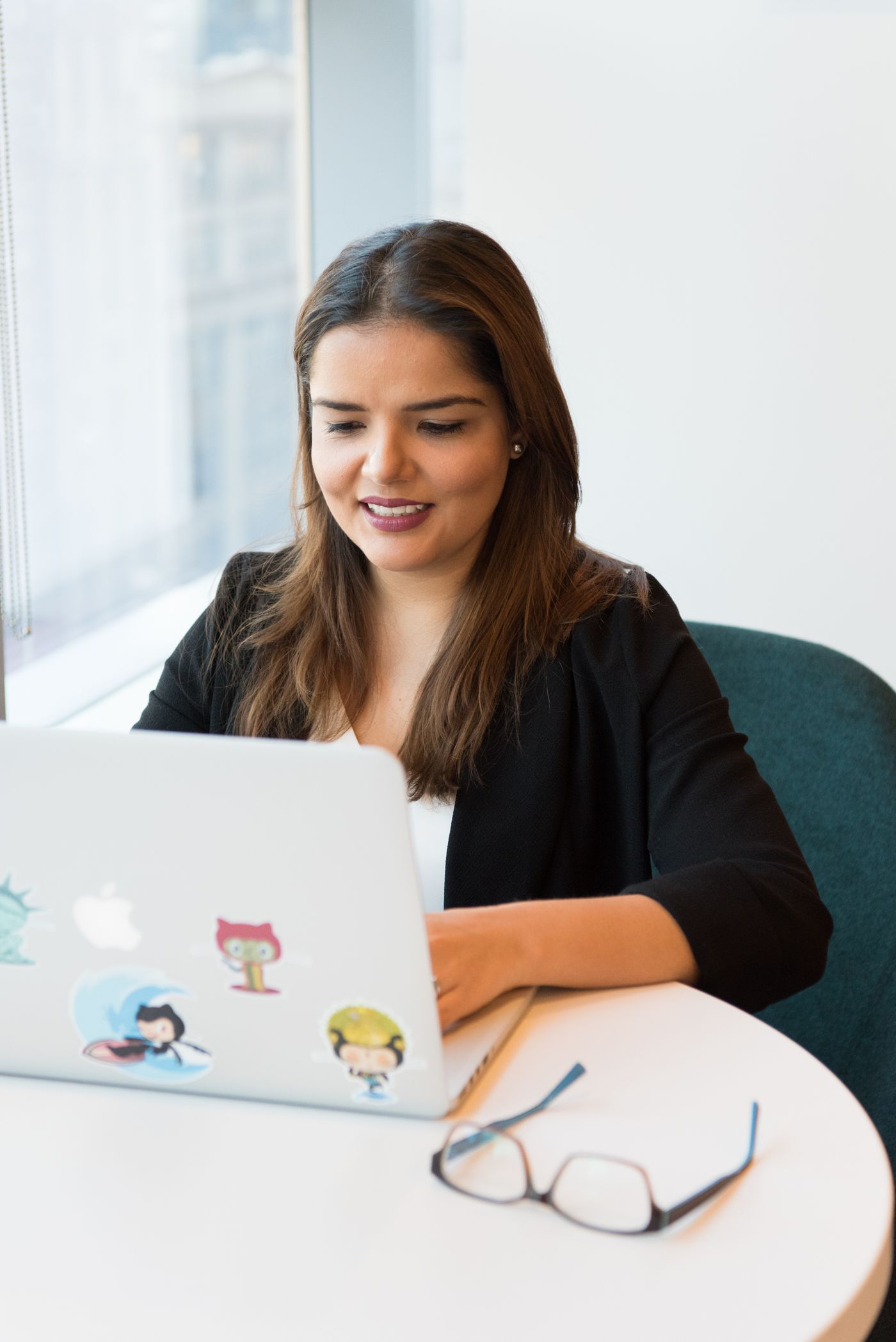 Focused professional working at a laptop